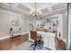 Cozy office space situated in an open floor plan with hardwood floors and natural light at 5725 Caviar Ct, Johns Island, SC 29455