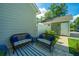 Inviting back porch featuring comfortable seating, creating an ideal outdoor living space at 618 Ravensridge Ln, Moncks Corner, SC 29461