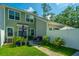 Green backyard offering an inviting outdoor living space with a patio and manicured lawn at 618 Ravensridge Ln, Moncks Corner, SC 29461