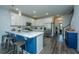 Modern kitchen features a large island, stainless appliances, and ample cabinet space for storage and functionality at 618 Ravensridge Ln, Moncks Corner, SC 29461