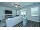Bright living room featuring a sliding glass door, neutral-toned furnishings, and plenty of natural light, ideal for relaxing at 618 Ravensridge Ln, Moncks Corner, SC 29461