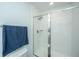 Shower with clear sliding doors and chrome fixtures within a tiled bathroom setting at 618 Ravensridge Ln, Moncks Corner, SC 29461