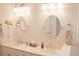 Bright bathroom with double sinks, marble countertops, and stylish fixtures at 683 Yellow Leaf Ln, Summerville, SC 29486