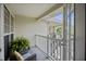 Outdoor balcony with seating area, overlooking the stairs at 700 Daniel Ellis Dr # 10305, Charleston, SC 29412
