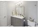 Bathroom with gray vanity, white counter, and neutral walls at 700 Daniel Ellis Dr # 10305, Charleston, SC 29412