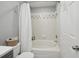 Cozy bathroom featuring a shower-tub combination and tiled walls at 700 Daniel Ellis Dr # 10305, Charleston, SC 29412