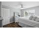 Bedroom featuring hardwood floors, dresser, and ceiling fan at 700 Daniel Ellis Dr # 10305, Charleston, SC 29412