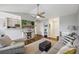 Inviting living room featuring modern decor, a ceiling fan, and hardwood floors at 700 Daniel Ellis Dr # 10305, Charleston, SC 29412