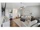 Cozy living room featuring modern décor, hardwood floors, and natural lighting at 700 Daniel Ellis Dr # 10305, Charleston, SC 29412