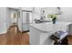 Spacious kitchen featuring stainless steel appliances, white cabinets, and a large island, ideal for cooking and entertaining at 708 Pitt St, Mount Pleasant, SC 29464