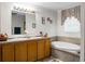 Elegant bathroom equipped with double sinks, soaking tub, and modern fixtures, providing comfort and style at 785 Coral Acres Dr, Moncks Corner, SC 29461