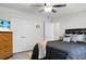 Spacious bedroom with a king-size bed, built-in closets, and a view to an adjacent room through an open door at 785 Coral Acres Dr, Moncks Corner, SC 29461