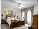 Comfortable bedroom boasting ample natural light, ceiling fan, and decorative touches, creating a tranquil retreat at 785 Coral Acres Dr, Moncks Corner, SC 29461