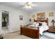 Inviting bedroom featuring a cozy bed, soft lighting, and calming decor, creating a relaxing and peaceful space at 785 Coral Acres Dr, Moncks Corner, SC 29461