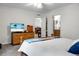 Comfortable bedroom with ensuite bathroom and closet access, television, drawers, and closet, ensuring convenience and privacy at 785 Coral Acres Dr, Moncks Corner, SC 29461