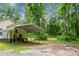 Exterior view of the home featuring an attached car port at 785 Coral Acres Dr, Moncks Corner, SC 29461