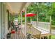 Inviting front porch with ample space and seating, perfect for relaxing outdoors at 785 Coral Acres Dr, Moncks Corner, SC 29461