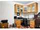A quaint office space features custom cabinets, a built-in desk area, and warm lighting, creating an inviting workspace at 785 Coral Acres Dr, Moncks Corner, SC 29461