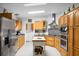Well-equipped kitchen featuring stainless steel appliances, wooden cabinets, and island at 785 Coral Acres Dr, Moncks Corner, SC 29461