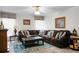 Well-lit living room with plush seating and decorative accents at 785 Coral Acres Dr, Moncks Corner, SC 29461