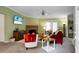 Inviting living room featuring a cozy fireplace, comfortable seating, and a ceiling fan at 785 Coral Acres Dr, Moncks Corner, SC 29461