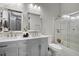 Beautiful bathroom with double sinks, shower/tub combination, with neutral colored walls and tile floors at 8453 Charleston Hwy, Walterboro, SC 29488