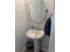 Charming half bath with pedestal sink and neutral decor at 9410 Sweep Dr, Summerville, SC 29485