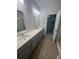 Spacious bathroom featuring double sink vanity and a walk-in shower at 9410 Sweep Dr, Summerville, SC 29485