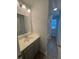 Bright bathroom with vanity, mirror and walk-in shower at 9410 Sweep Dr, Summerville, SC 29485