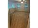View of carpeted bonus room with ceiling fan and natural light from three windows at 9410 Sweep Dr, Summerville, SC 29485