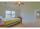 Bedroom with bright windows, carpeted floors and a vaulted ceiling with a ceiling fan at 9682 Pebble Creek Blvd, Summerville, SC 29485