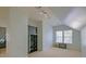 Upstairs Bonus Room featuring an angled ceiling, built-in shelves and neutral carpet at 9682 Pebble Creek Blvd, Summerville, SC 29485
