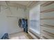 Walk-in closet with custom shelves and rod system, providing ample storage at 9682 Pebble Creek Blvd, Summerville, SC 29485