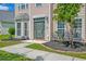 Inviting home entrance with a well-manicured lawn and space for seating at 9682 Pebble Creek Blvd, Summerville, SC 29485