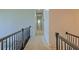 Upstairs hallway features carpeted floor and neutral walls with access to bedrooms at 9682 Pebble Creek Blvd, Summerville, SC 29485