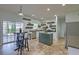 Eat-in kitchen with stainless appliances, light countertops, and slider to outside at 9682 Pebble Creek Blvd, Summerville, SC 29485