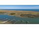 Aerial view showcasing expansive waterway with private docks leading to the ocean at 0 Doar Rd, Awendaw, SC 29429