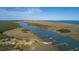 Aerial showcases extensive waterway and private docks leading to the ocean at 0 Doar Rd, Awendaw, SC 29429