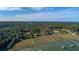 Expansive aerial shot showcases a waterfront community with private docks and scenic landscape at 0 Doar Rd, Awendaw, SC 29429