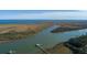 Scenic aerial view of the river, marshland and ocean, offering serene waterfront living at 0 Doar Rd, Awendaw, SC 29429