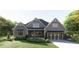 Charming craftsman-style home featuring a well-manicured lawn, gray siding, and eye-catching curb appeal at 0 Doar Rd, Awendaw, SC 29429