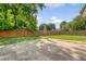 Backyard with privacy fence and patio features an open space for outdoor activities at 1 Bossis Dr, Charleston, SC 29407