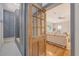 Inviting living room with wood door opens to a mudroom with storage lockers at 1 Bossis Dr, Charleston, SC 29407