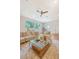 Bright living room filled with natural light boasts stylish decor and hardwood floors at 1 Bossis Dr, Charleston, SC 29407