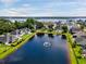 Scenic aerial view of the beautiful neighborhood with a pond and fountain, offering picturesque scenery at 1003 Jervey Point Rd, Wando, SC 29492