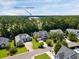 Aerial shot showing nearby Philip Simmons High School in relation to surrounding homes and landscape at 1003 Jervey Point Rd, Wando, SC 29492