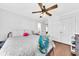 Cozy bedroom featuring a wood floor, ceiling fan and an attached bathroom at 1003 Jervey Point Rd, Wando, SC 29492
