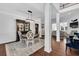 Elegant dining room featuring hardwood floors, stylish furniture, and ample natural light at 1003 Jervey Point Rd, Wando, SC 29492
