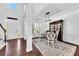 Elegant dining area featuring hardwood floors, stylish furniture, and a bright airy design at 1003 Jervey Point Rd, Wando, SC 29492