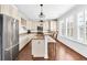 Eat-in kitchen features granite countertops, stainless steel appliances, and classic white cabinetry at 1003 Jervey Point Rd, Wando, SC 29492